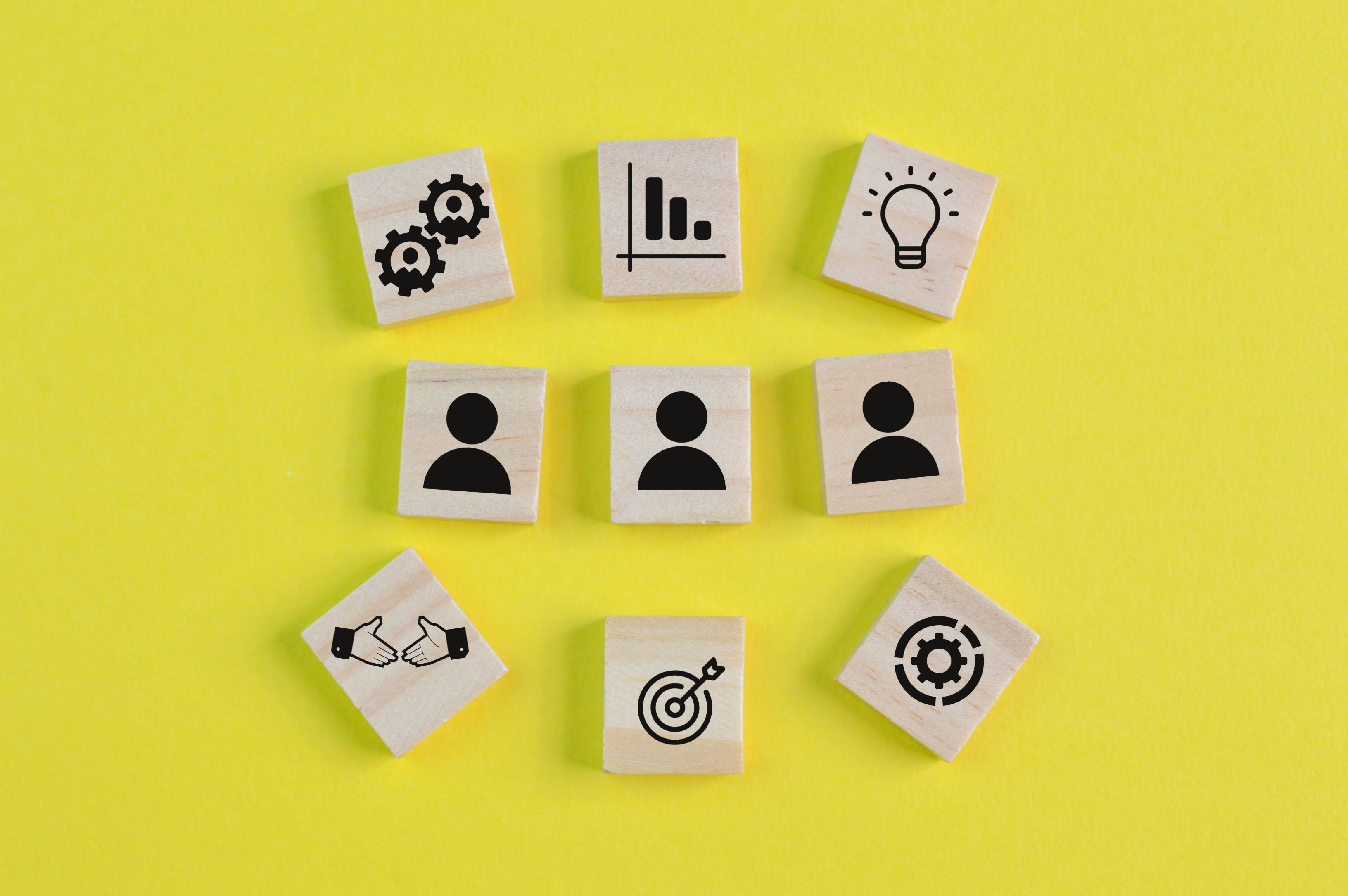 wooden-block-with-business-success-achievement-and-2025-03-10-14-44-30-utc